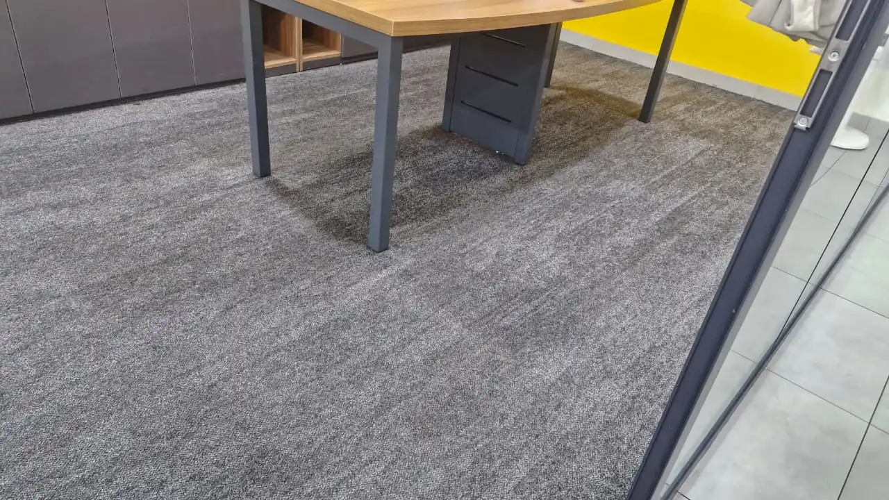 Freshly extracted office carpet after deep cleaning