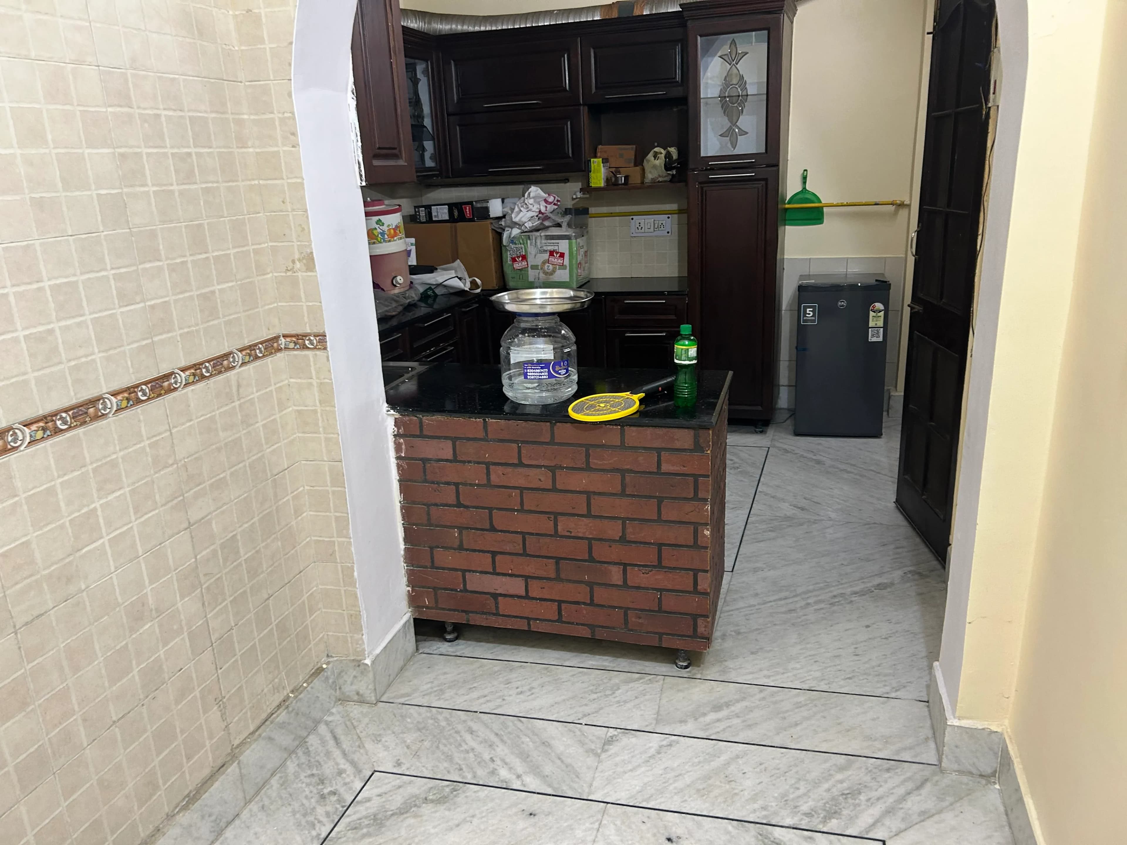 Full kitchen walkthrough during a home deep cleaning job in Delhi